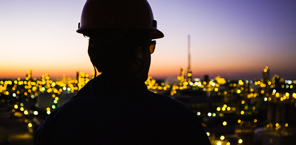 Kuraray America Plant Worker Top of the Tower at Night