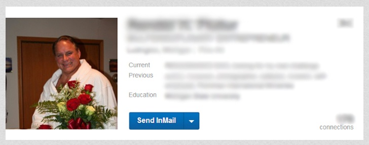 Weird LinkedIn Photo of Guy in Bathrobe Holding Bouqet of Flowers